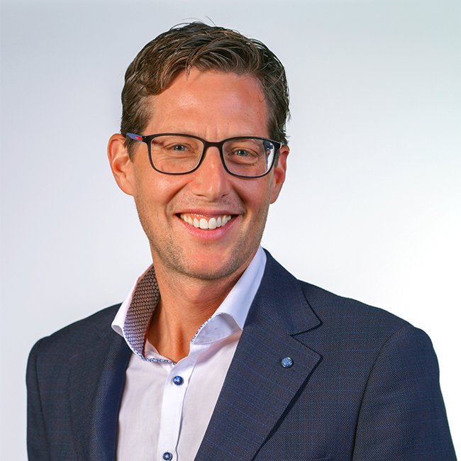 a man smiling for the camera