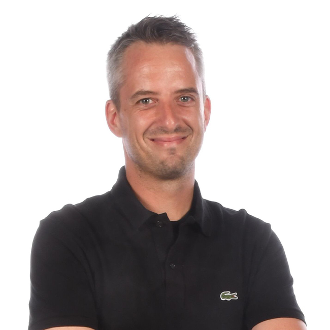a man smiling for the camera
