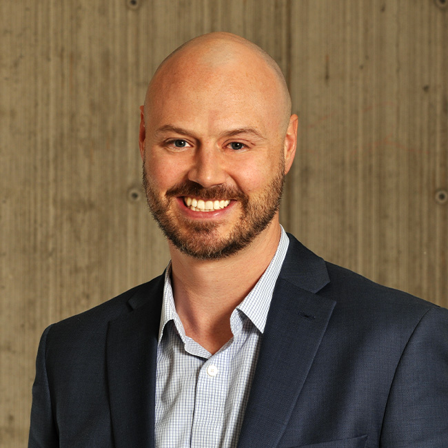 a man smiling for the camera