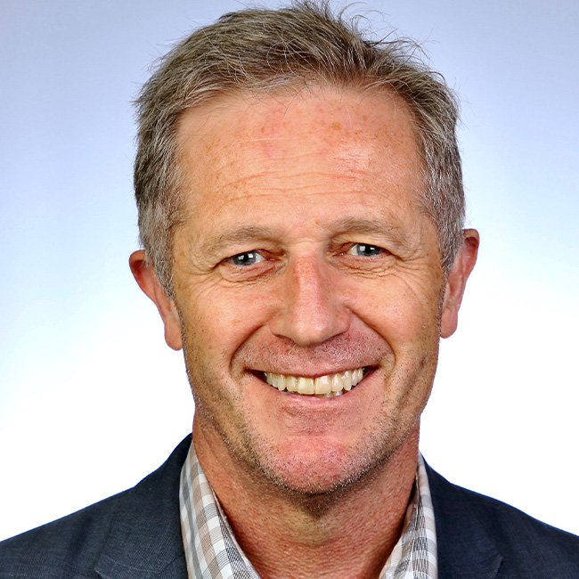 a man smiling for the camera