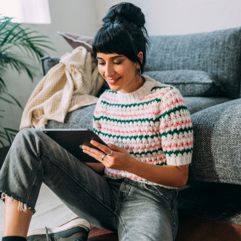 a woman sitting on a couch